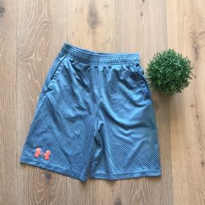 Under Armour heatgear shorts. Blue with orange logo. Youth XL.